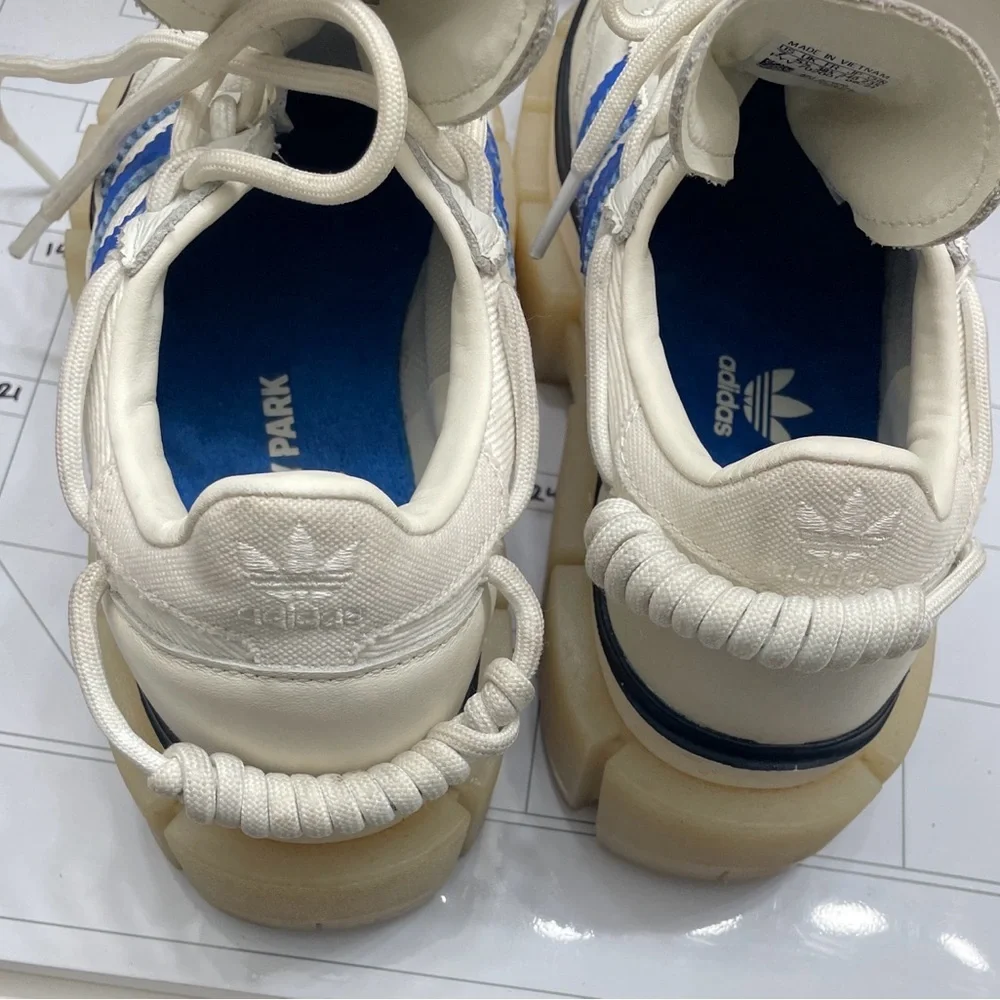 Size 7/5- adidas Ivy Park x Super Super Sleek Rodeo - Glow Blue W